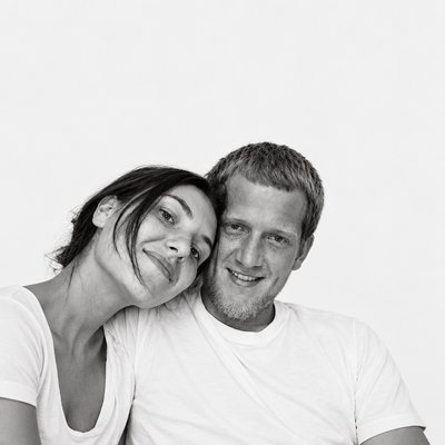 a black and white photo of a man and a woman