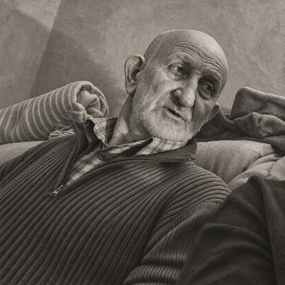 a black and white photo of an older man