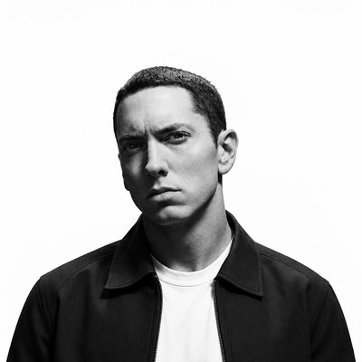 a black and white photo of a man in a jacket