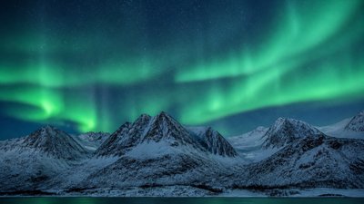 a flowing aurora over snowy peaks, wide sweeping composition, no people, no text