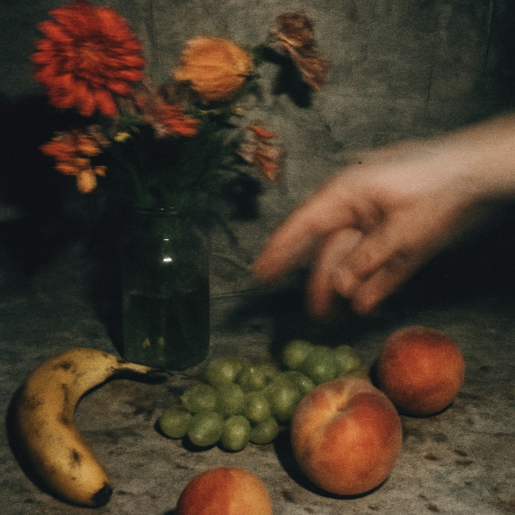 still life arrangement of fruits and flowers