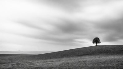 sweeping panoramic landscape with a dramatic sky