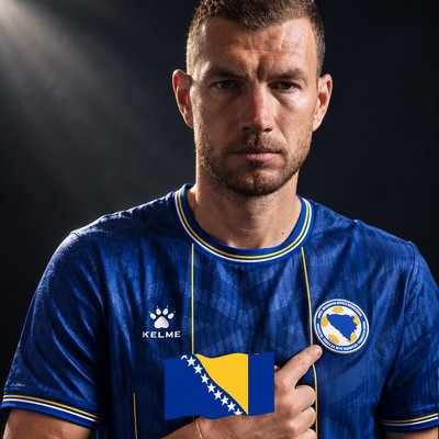 a man holding a soccer ball in his hands