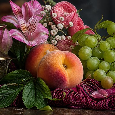 still life arrangement of fruits and flowers