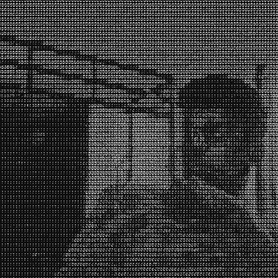 a black and white photo of a man in a room