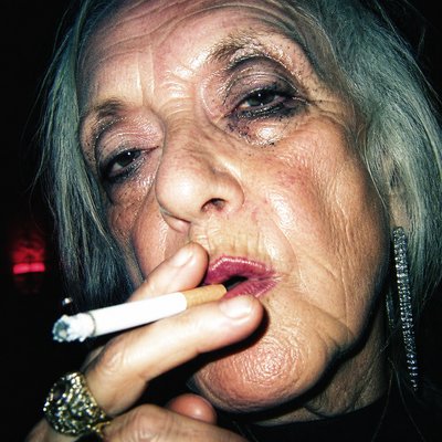 close-up portrait of an elderly person with expressive weathered features