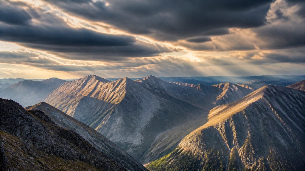 sweeping panoramic landscape with a dramatic sky