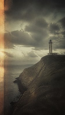 a lone lighthouse on a cliff at dusk under a dramatic sky, no text or lettering