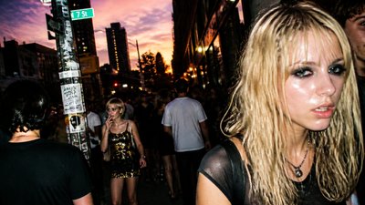 bustling city street panorama at dusk