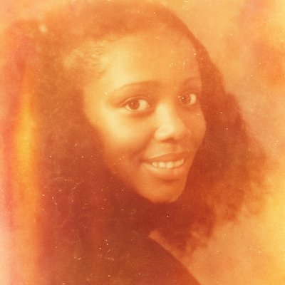 a close up of a person with long hair