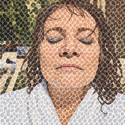 a woman with her eyes closed and her eyes closed