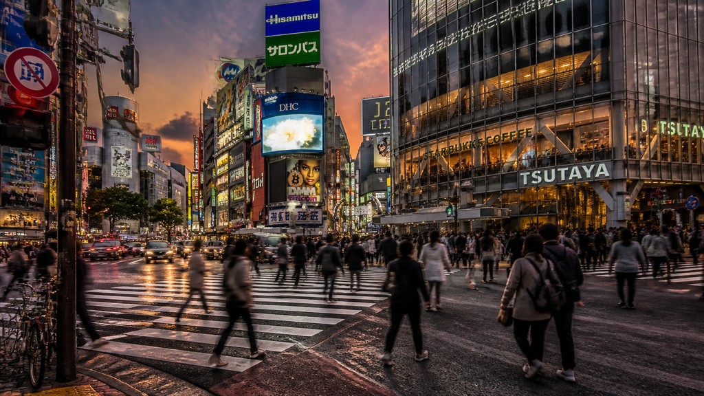 bustling city street panorama at dusk