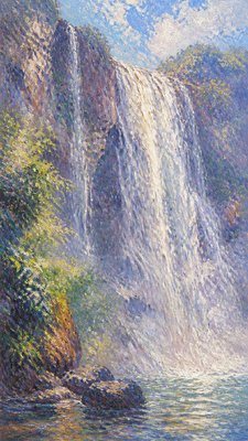 towering waterfall cascading down a cliff