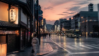 bustling city street panorama at dusk