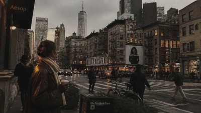 bustling city street panorama at dusk