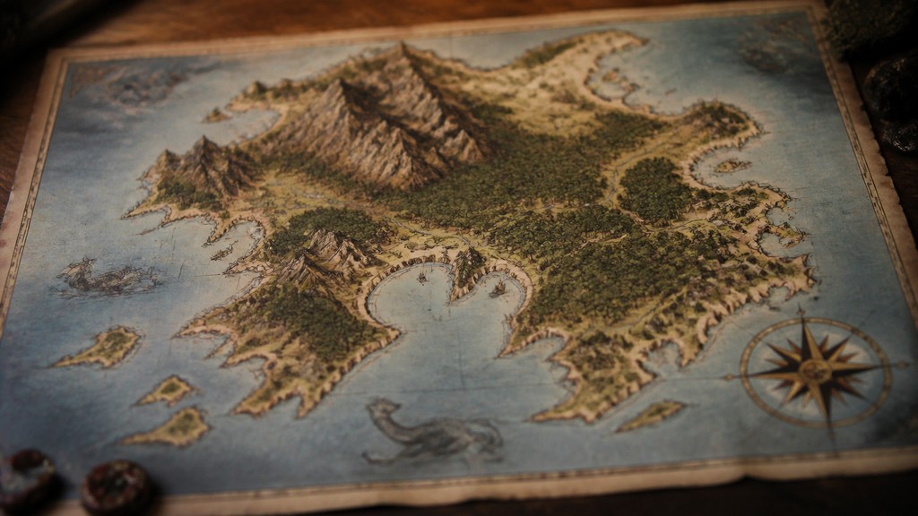 a map of an island realm with mountains, forests, a sheltered bay, sea monsters in the water and a compass rose, no text labels