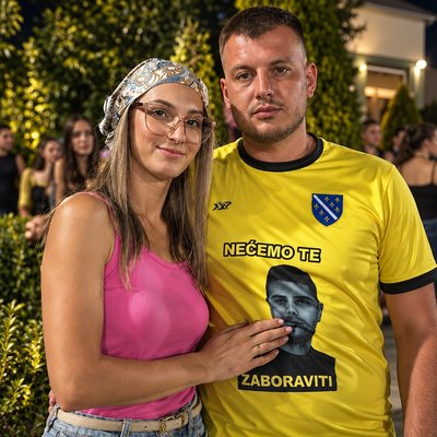 a man and a woman posing for a picture
