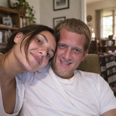 a man and a woman sitting on a couch