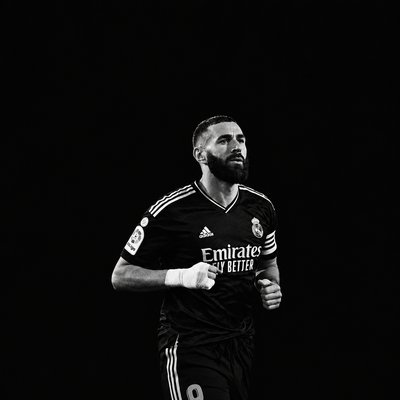 a man running in a black and white photo