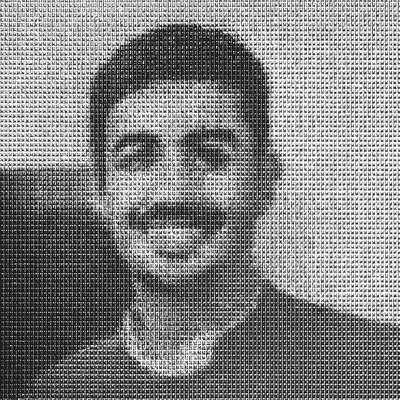 a black and white photo of a man with a mustache