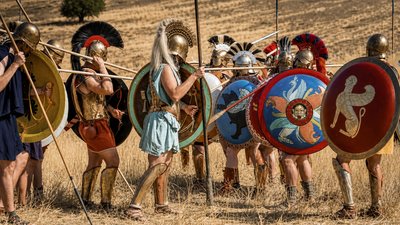a group of people standing next to each other on a field