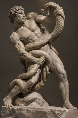 sculpture of an ancient greek athlete struggling with a python snake coiled around his body