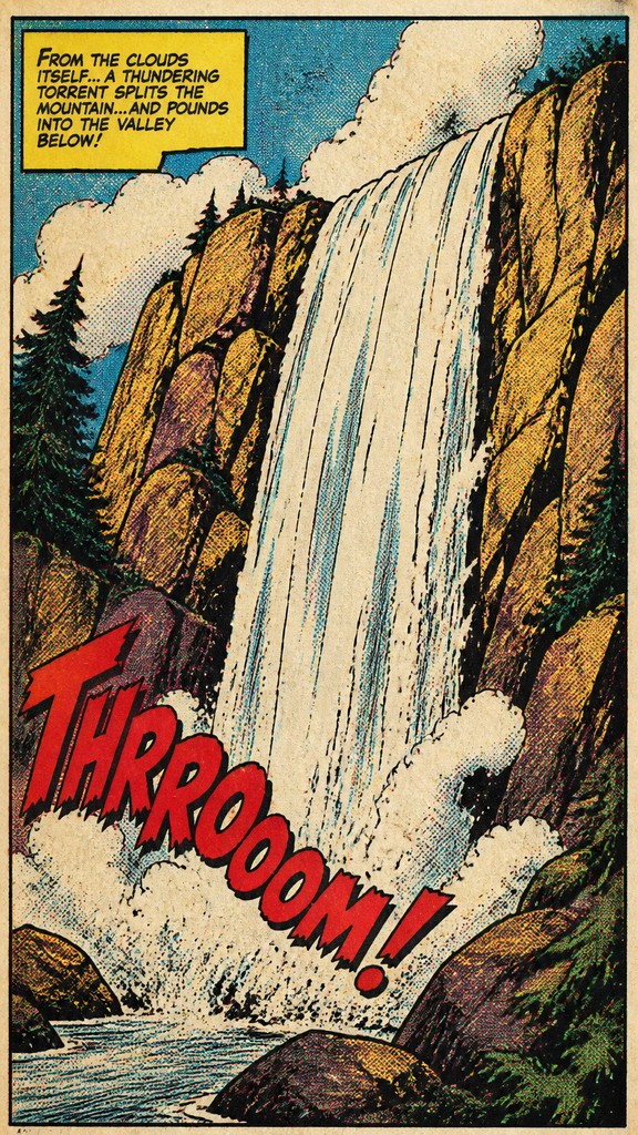 towering waterfall cascading down a cliff