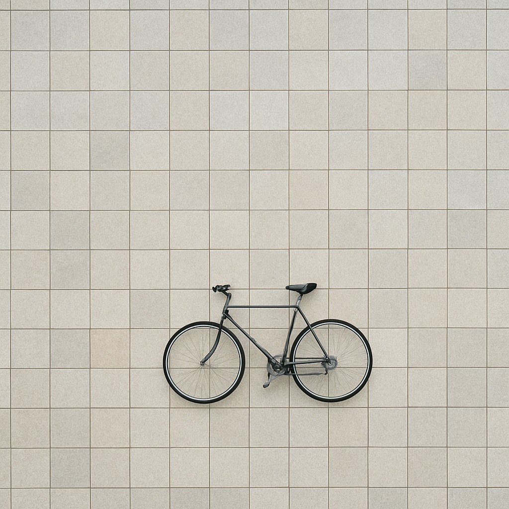 bicyle resting against a wall
