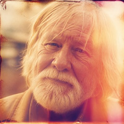 close-up portrait of an elderly person with expressive weathered features
