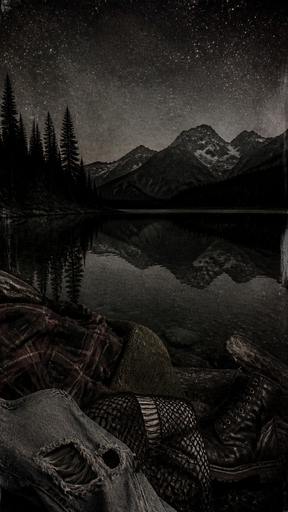a tranquil mountain lake beneath a starry night sky, no people, no text