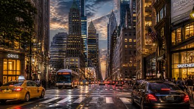 bustling city street panorama at dusk