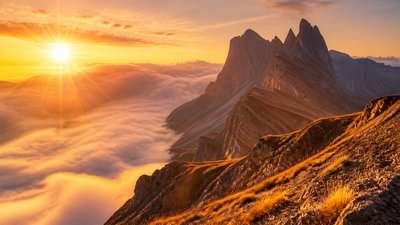 a wide alpine ridge above a sea of clouds, no people