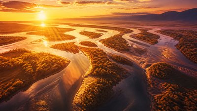 a wide river delta seen from above at sunset, no people