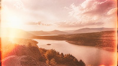 sweeping panoramic landscape with a dramatic sky