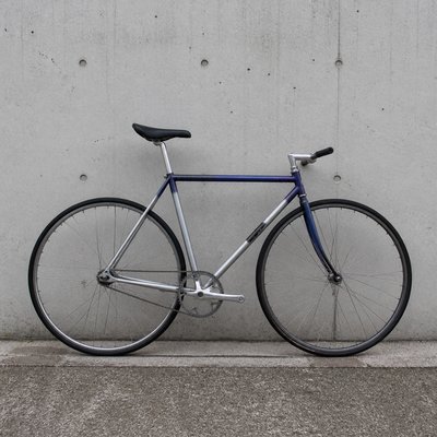 bicyle resting against a wall — Photo-Conceptual Art Style