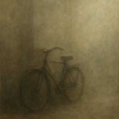 bicyle resting against a wall