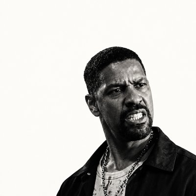 a black and white photo of a man making a face