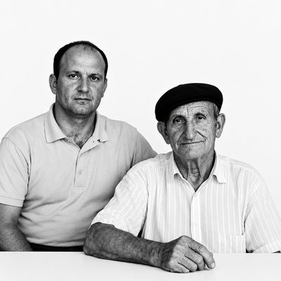 a black and white photo of two men