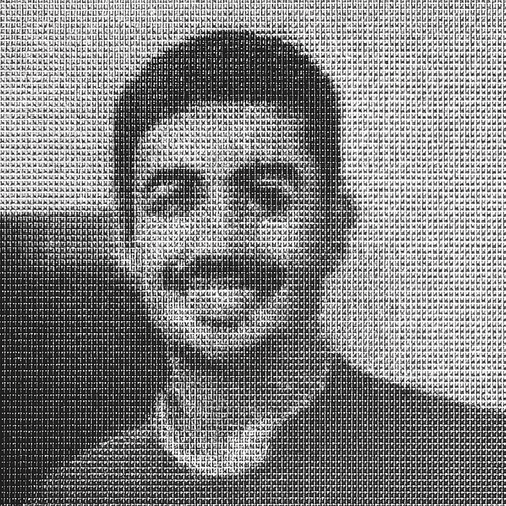 a black and white photo of a man with a mustache