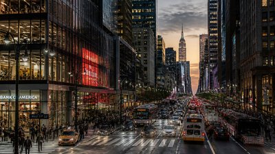 bustling city street panorama at dusk