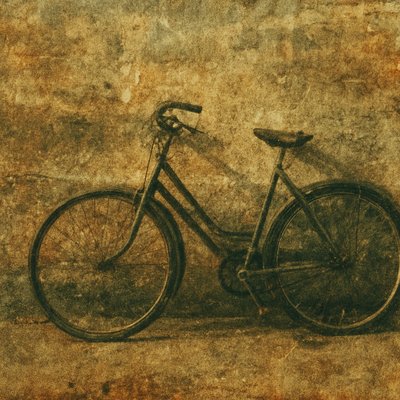 bicyle resting against a wall