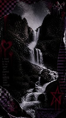a cascading waterfall in a lush green gorge, no people