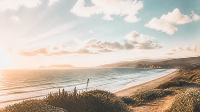 sweeping panoramic landscape with a dramatic sky