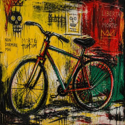 bicyle resting against a wall