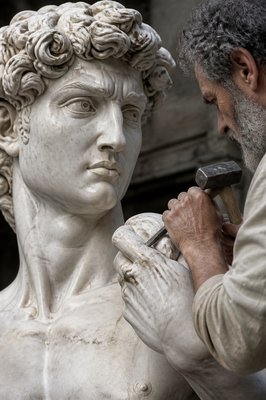 Michelangelo carving statue of David