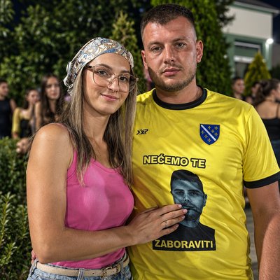 a man and a woman posing for a picture