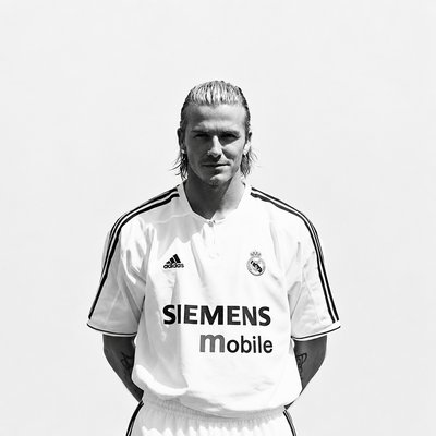 a man in a soccer uniform poses for a picture
