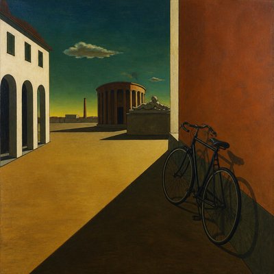 bicyle resting against a wall
