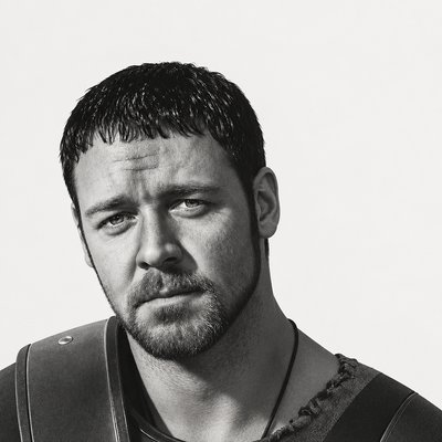 a black and white photo of a man with a beard