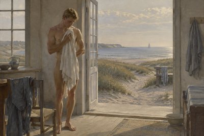 a danish ignudi athlete drying off with towel by the sea